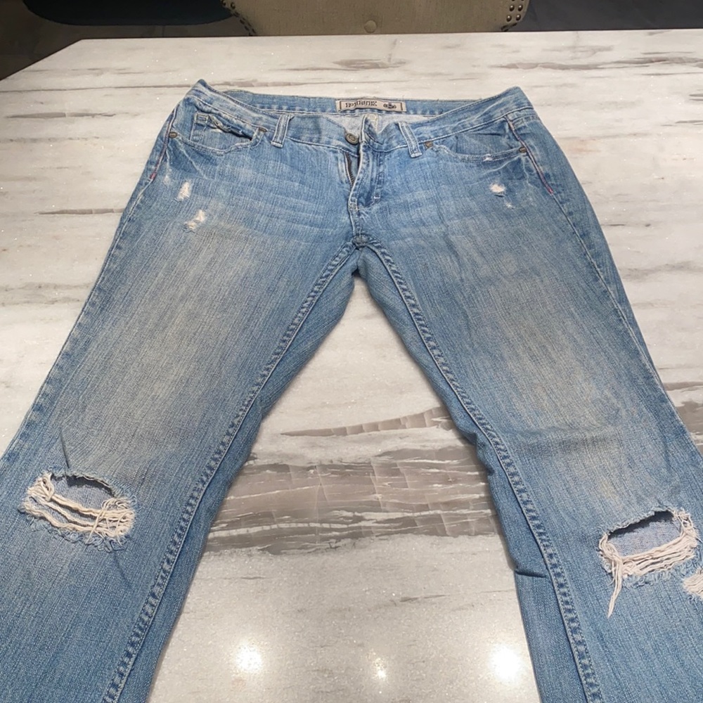 VS Pink light wash distressed jeans